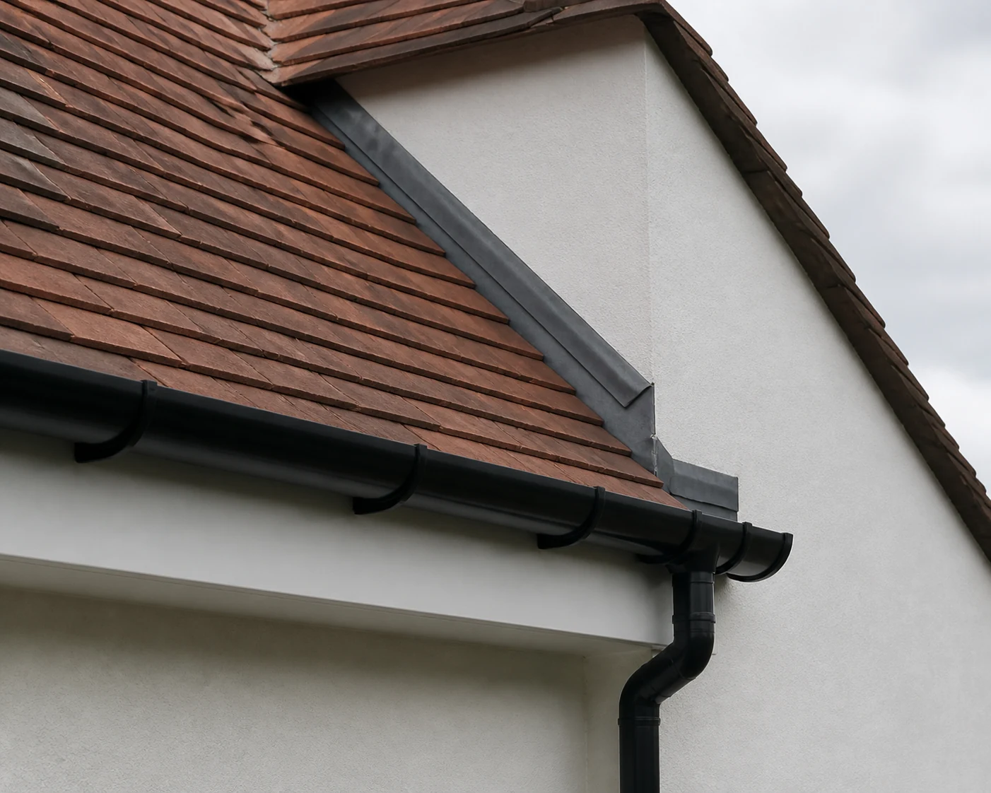 Clean maintained roofline with protected leadwork joint